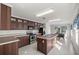 Kitchen with island, stainless steel appliances at 7601 Se 22Nd Ave, Ocala, FL 34480