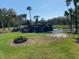 Landscaped area with a waterfall feature at 7658 Sw 180Th Cir, Dunnellon, FL 34432