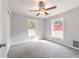 Bedroom with neutral walls, a ceiling fan, and bright natural light at 7670 Se 110Th Street Rd, Belleview, FL 34420