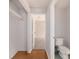 Hallway leading to bedroom and toilet with closet space at 7670 Se 110Th Street Rd, Belleview, FL 34420