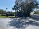 Community entrance sign with beautiful water feature at Juliette Falls enhancing the curb appeal at 7673 Sw 180Th Cir, Dunnellon, FL 34432