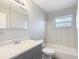 Bathroom featuring a vanity, toilet, tub, and shower at 7688 Se 135Th St, Summerfield, FL 34491