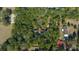 Aerial view of a home surrounded by trees at 7740 Sw 70Th Ave, Ocala, FL 34476