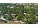 Aerial view showcasing a large lot with surrounding trees at 7740 Sw 70Th Ave, Ocala, FL 34476