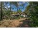 Spacious backyard with mature trees and shrubs at 7740 Sw 70Th Ave, Ocala, FL 34476