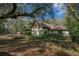 House with large backyard and mature trees at 7740 Sw 70Th Ave, Ocala, FL 34476