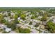 Wide aerial shot of homes in a landscaped community with mature trees and well-manicured lawns at 8510 Sw 108Th Place Rd, Ocala, FL 34481