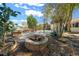 Well-manicured backyard complete with fire pit and brick paver patio at 8639 Sw 116Th Lane Rd, Ocala, FL 34481