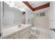 Well-lit bathroom featuring a single sink vanity and a bath tub with shower at 8639 Sw 116Th Lane Rd, Ocala, FL 34481