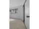 Bright bedroom features a large window and a sliding-door closet at 8639 Sw 116Th Lane Rd, Ocala, FL 34481