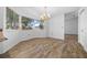 Dining area featuring tile flooring, a chandelier, and large windows at 8639 Sw 116Th Lane Rd, Ocala, FL 34481