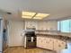 Kitchen with stainless steel appliances, including range, white cabinets and white tile backsplash at 8639 Sw 116Th Lane Rd, Ocala, FL 34481