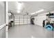 Spacious garage with epoxy flooring and ample storage space at 8707 Sw 95Th Ln # G, Ocala, FL 34481