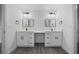 Bathroom with double vanity and modern lighting at 9731 Bahia Rd, Ocala, FL 34472