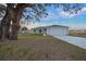 New home exterior with gray siding and concrete driveway at 9731 Bahia Rd, Ocala, FL 34472