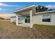 Covered patio with sliding glass doors at 9731 Bahia Rd, Ocala, FL 34472