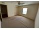 Carpeted bedroom with double-door closet and window coverings at 9761 Sw 90Th St, Ocala, FL 34481