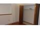 This bedroom features an open closet and a window for natural light at 10015 Sw 90Th Ct, Ocala, FL 34481