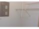 Interior closet with white wire shelving system and electrical panel at 10015 Sw 90Th Ct, Ocala, FL 34481