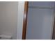View into closet space with a toilet and wire shelving system at 10015 Sw 90Th Ct, Ocala, FL 34481