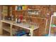 This storage room includes shelves, and open table space at 10015 Sw 90Th Ct, Ocala, FL 34481