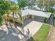Charming one-story brick home with a well-manicured front yard and a spacious driveway at 10900 Se Timucuan Rd, Summerfield, FL 34491