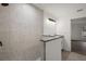 Bright bathroom with a standing shower, marble style tiling and double granite vanity at 13743 Sw 113 Ln, Dunnellon, FL 34432