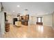 Well-lit living space featuring a modern kitchen, and hardwood floors at 1610 Se 22Nd Ave, Ocala, FL 34471