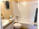 Bathroom with a tile shower/tub and cultured marble vanity at 1904 Ne 50Th St, Ocala, FL 34479