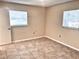 Bedroom features multiple entry and closet doors and tile flooring at 1904 Ne 50Th St, Ocala, FL 34479
