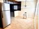 Bright kitchen with updated appliances and tile floor at 1904 Ne 50Th St, Ocala, FL 34479
