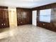 View of living room leading to hallway with tile flooring at 1904 Ne 50Th St, Ocala, FL 34479