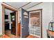 Home's entryway leading into the home with view to kitchen at 19390 Se 95Th Pl, Ocklawaha, FL 32179