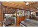 Charming covered outdoor patio with rustic decor offering scenic views of the surrounding landscape at 19390 Se 95Th Pl, Ocklawaha, FL 32179
