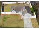 Charming single-story home features a fenced yard, concrete driveway, and well-maintained landscaping at 2 Hemlock Terrace Trl, Ocala, FL 34472