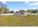 Spacious backyard with patio and picket fencing at 2 Hemlock Terrace Trl, Ocala, FL 34472