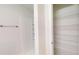 Bathroom featuring wire shelving for ample linen storage and a towel rack at 24264 Sw South Hills Ct, Dunnellon, FL 34431
