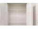 Spacious pantry features white wire shelving for organized storage and white doors at 24264 Sw South Hills Ct, Dunnellon, FL 34431
