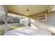 A covered patio area provides additional space for enjoying the outdoors at 24264 Sw South Hills Ct, Dunnellon, FL 34431