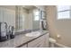 Tastefully designed bathroom featuring granite counters, modern fixtures, and ample natural light at 4766 Nw 39Th Street Rd, Ocala, FL 34482