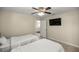 Bright bedroom with twin beds and tiled floors at 4940 E Fort King St, Ocala, FL 34470