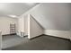 Spacious bonus room with carpet, natural light, and unique architectural details at 4940 E Fort King St, Ocala, FL 34470