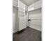 Bright walk-in closet with custom shelving and drawers for organized storage at 4940 E Fort King St, Ocala, FL 34470