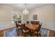 Chic dining room with traditional decor, wooden table, and bright natural light at 4940 E Fort King St, Ocala, FL 34470