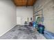 Spacious garage with high ceilings and bare concrete walls, ready for customization at 4940 E Fort King St, Ocala, FL 34470