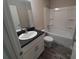 Bathroom featuring a single sink vanity, granite countertops, and a shower and tub combo at 1 Fisher Lane Way, Ocklawaha, FL 32179