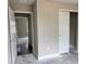 Spacious bedroom with closet ready for new flooring at 1 Fisher Lane Way, Ocklawaha, FL 32179
