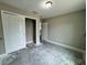 Unfinished bedroom with double closet and neutral paint ready for customization at 1 Fisher Lane Way, Ocklawaha, FL 32179