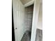 Walk-in closet showing wire rack shelving and wood-look flooring at 1 Fisher Lane Way, Ocklawaha, FL 32179