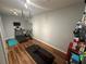 Spacious home gym featuring workout equipment, rubber flooring, and ample natural light at 130 Harbour Cove Way, Clermont, FL 34711
